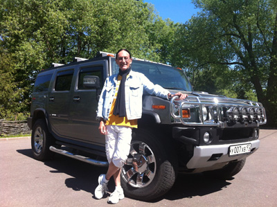 ken in russia next to a humvee